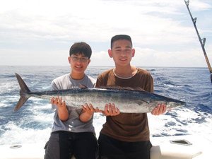 proud kids with wahoo St Maarten Fishing